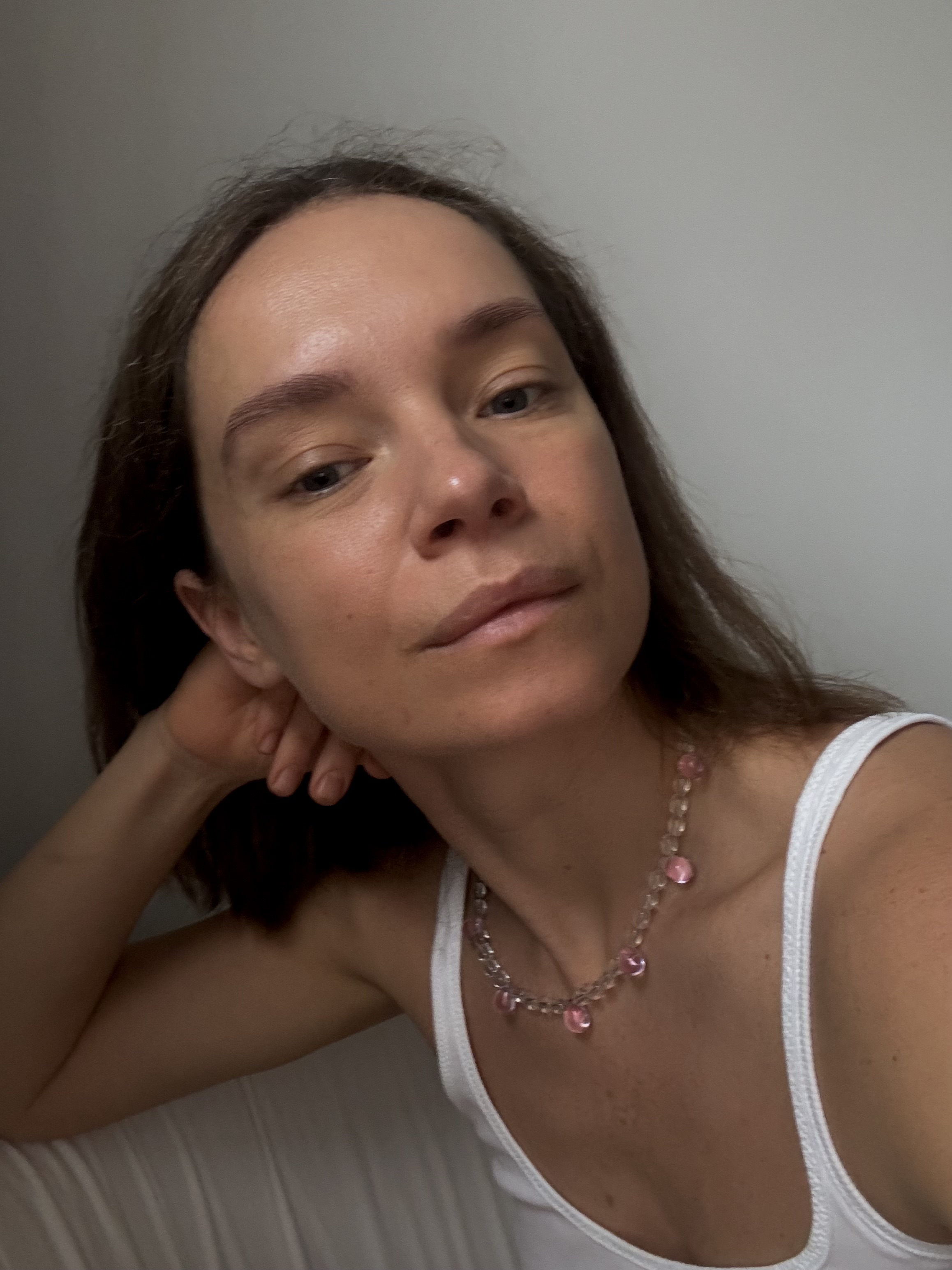A short necklace made of clear, transparent beads accented with small colorful drops. The beads are arranged in a layered, sculptural pattern that catches the light with every movement. 

Glass beads 
Sterling silver hardware

47 cm length

Handcrafted in Berlin