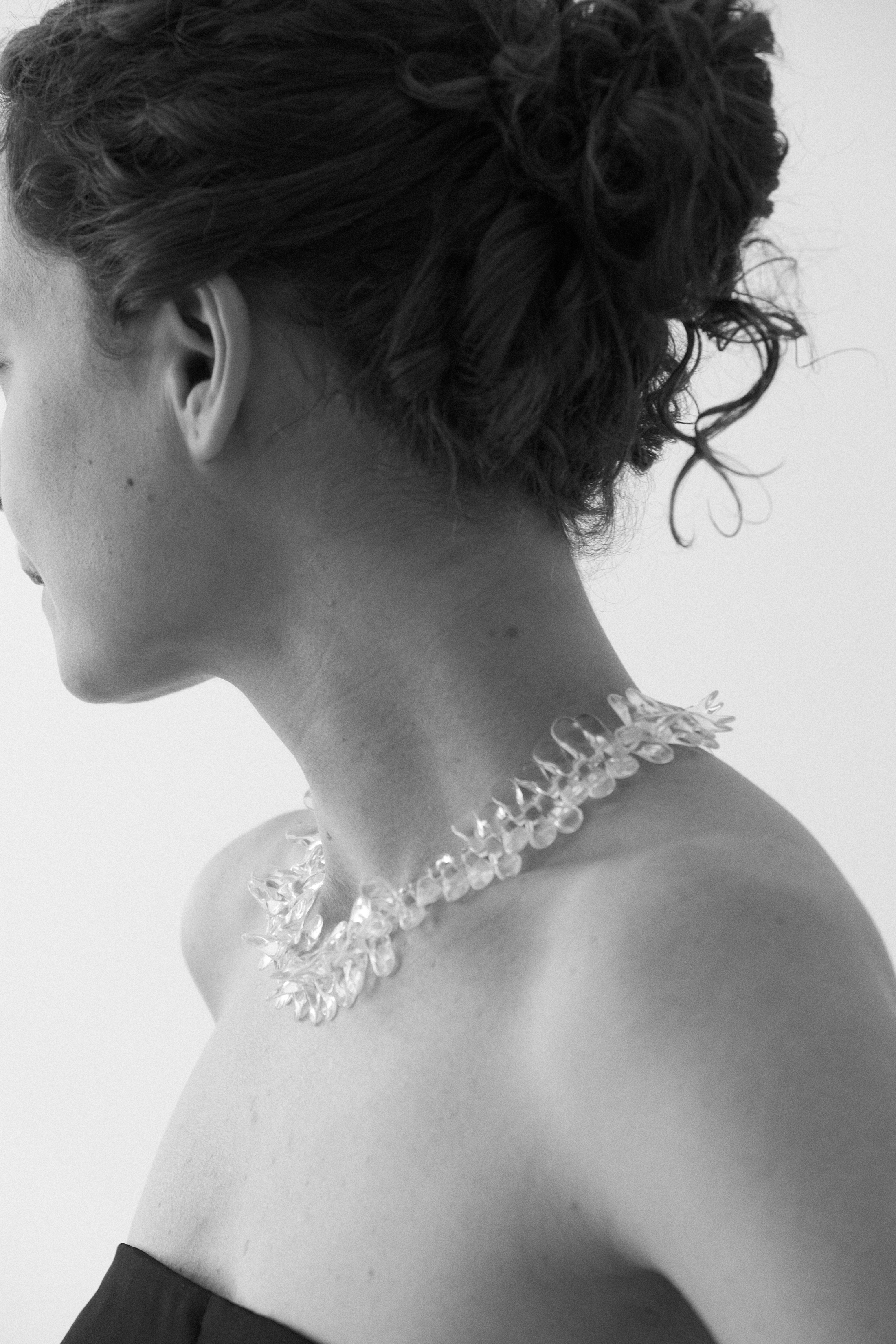 A delicate statement necklace made of translucent beads that softly catch the light

Glass beads 
Sterling silver hardware

47 cm length

Handcrafted in Berlin